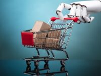 Robot holding shopping cart with cardboard boxes